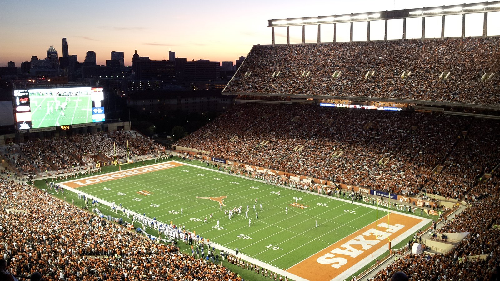 Darrell K Royal-Texas Memorial Stadium at night in Austin, home of Texas Longhorns football — Texas football, home of some of the best NFL players