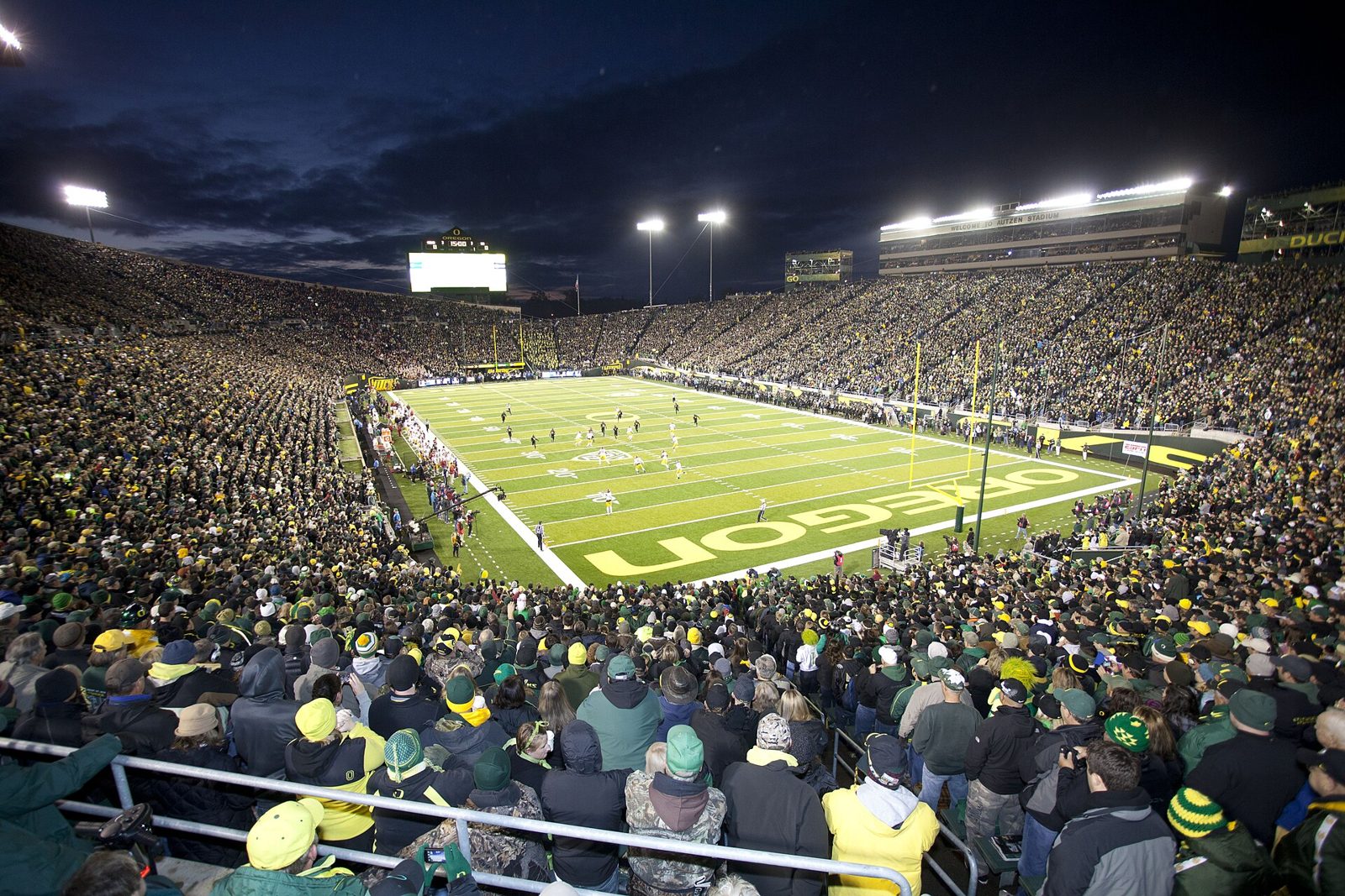Autzen Stadium in Eugene lit up at night, home of Oregon Ducks football — Oregon football, home of some of the best NFL players